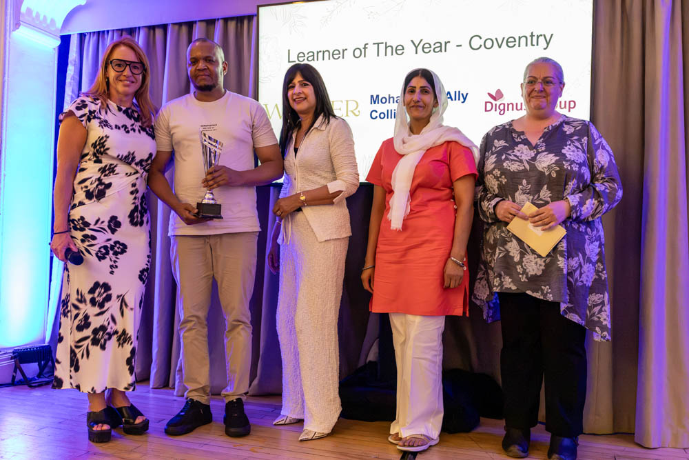 Mohammed Ally from Colliers receiving the Learner of the Year award in Coventry